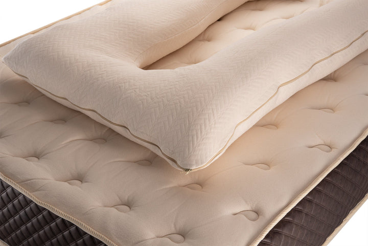 Close up of hemp and organic cotton with raw wool stuffing U-shaped pregnancy pillow by Woolland 