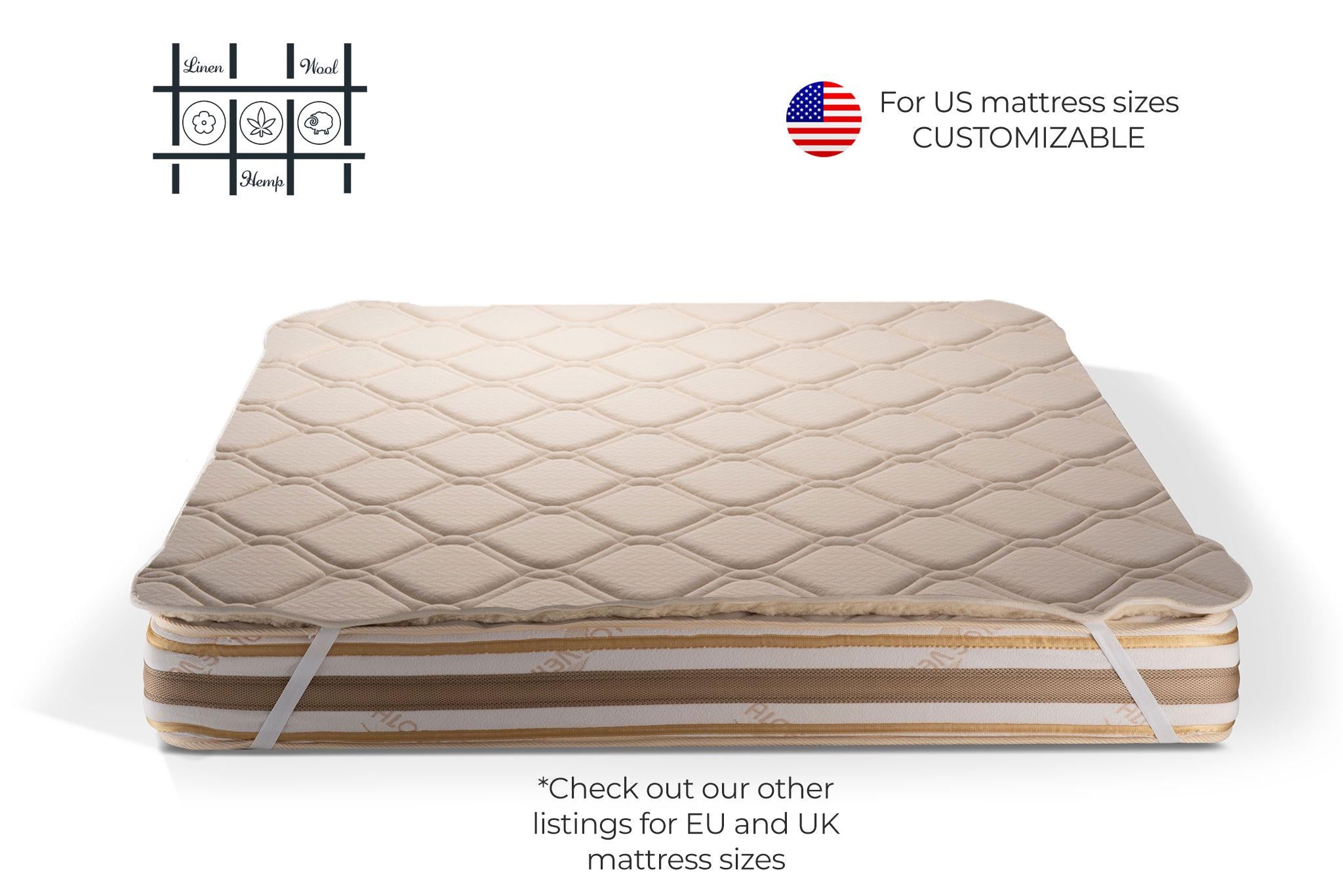 Hemp and merino wool mattress topper with straps on a white background, featuring customizable text for US mattress sizes. Handcrafted by Woolland