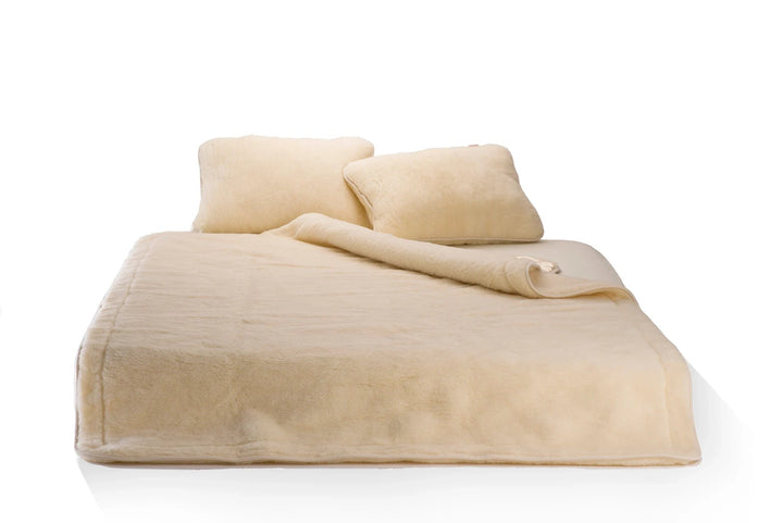 Fluffy merino wool blanket in set with two merino wool pillows made by the Woolland