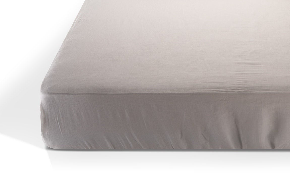 Close up of white linen flat sheet by Woolland