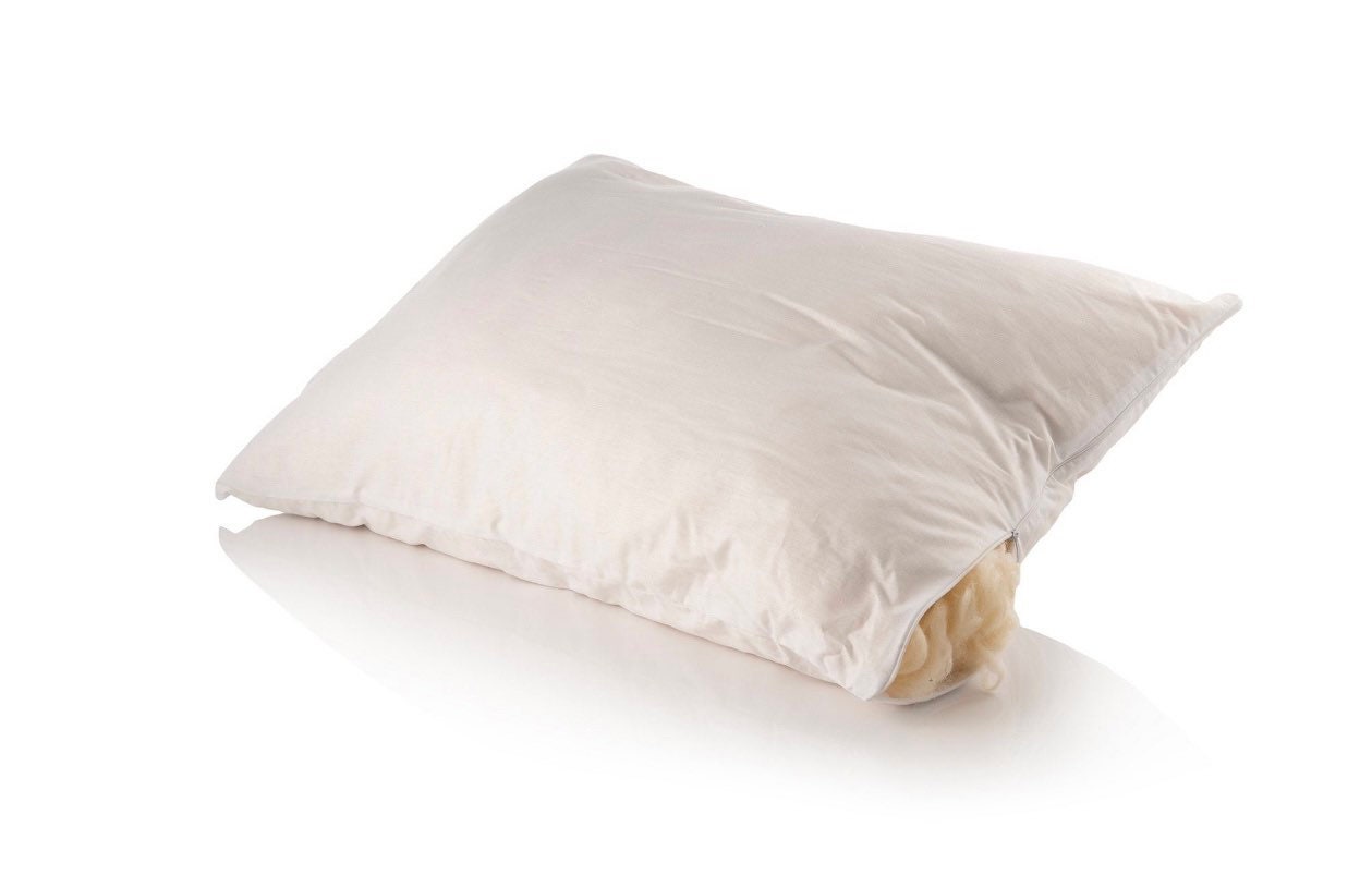 All natural sleeping pillow. Cotton cover with zipper and raw wool stuffing