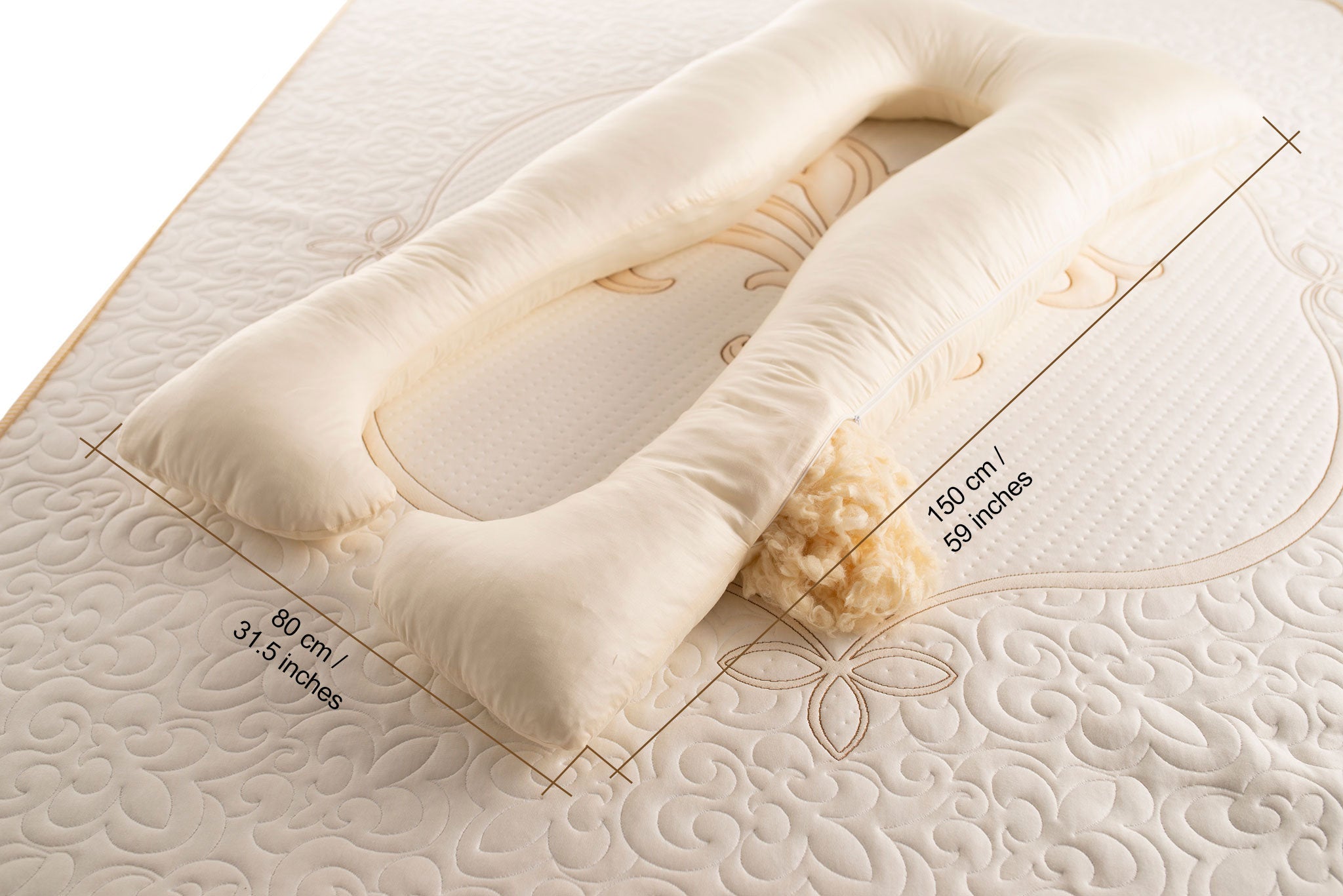 Cotton sateen and raw wool filling u-shaped pregnancy pillow with sizes 80 x 150 cm (31.5 x 59 inches). Handmade by Woolland