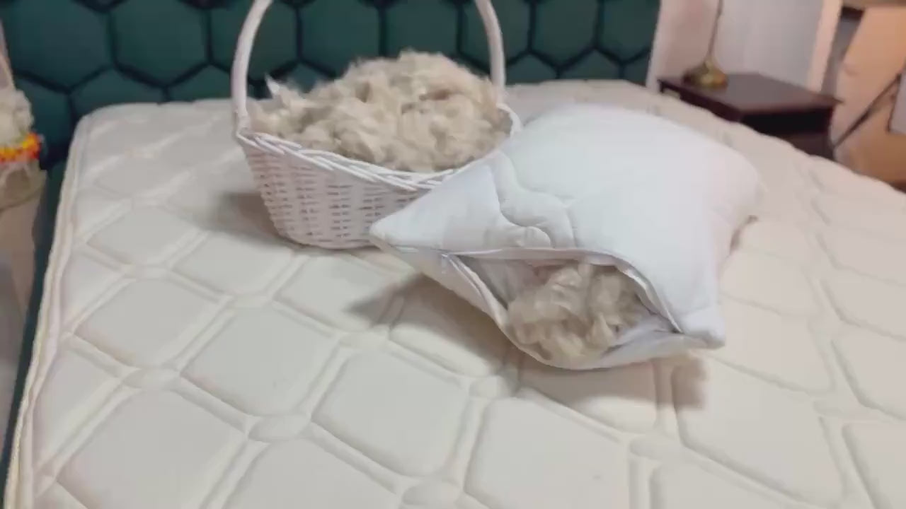 Video of quilted pure linen cover and raw kapok fibers filling natural bed pillow handmade by Woolland Europe