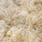 Close-up of raw wool processed on balls 
