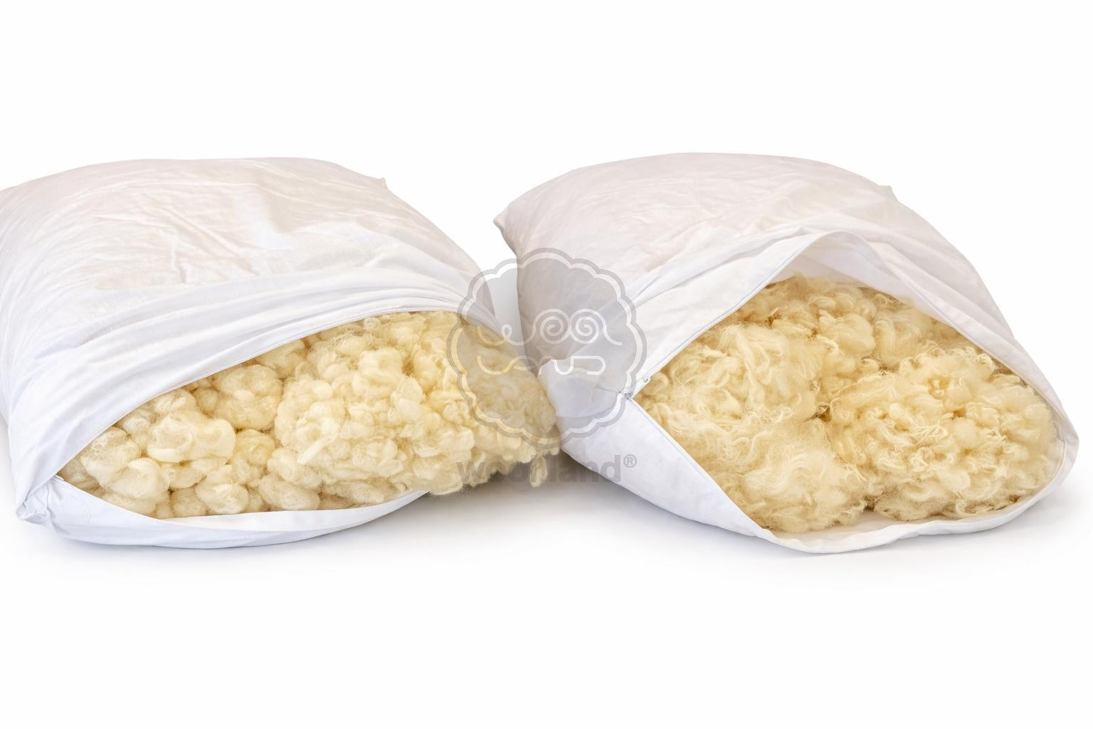 Two white pillows filled with raw wool on a white background. Handmade by Woolland