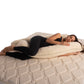 A frontal look of pregnant beautiful lady with merin wool full body pregnancy pillow by woolland
