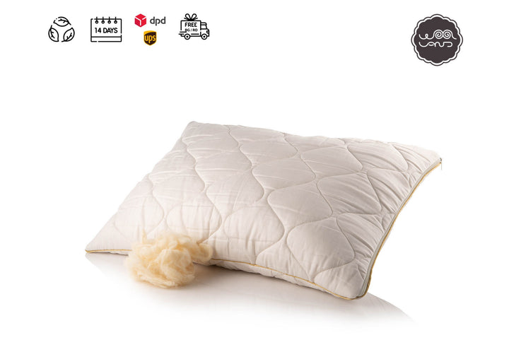 A quilted organic wool pillow with a white cotton sateen cover, displaying a hypoallergenic label, a zipper closure icon, and a raw wool filling symbol.